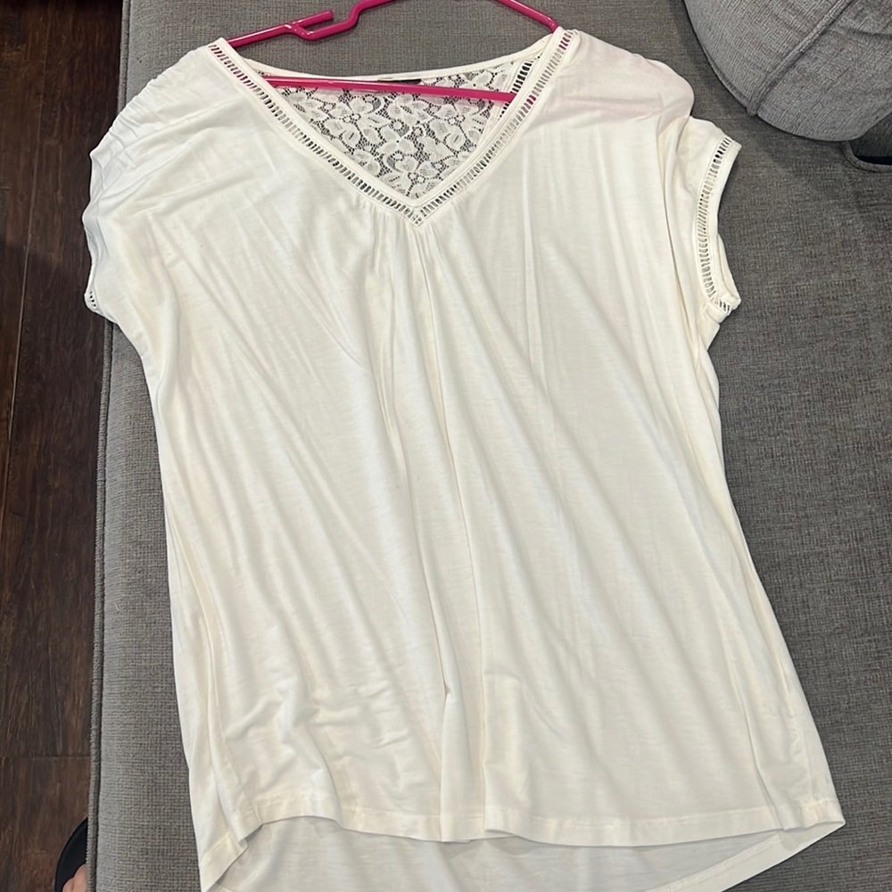 Off white blouse. Size large. Tag is cut.